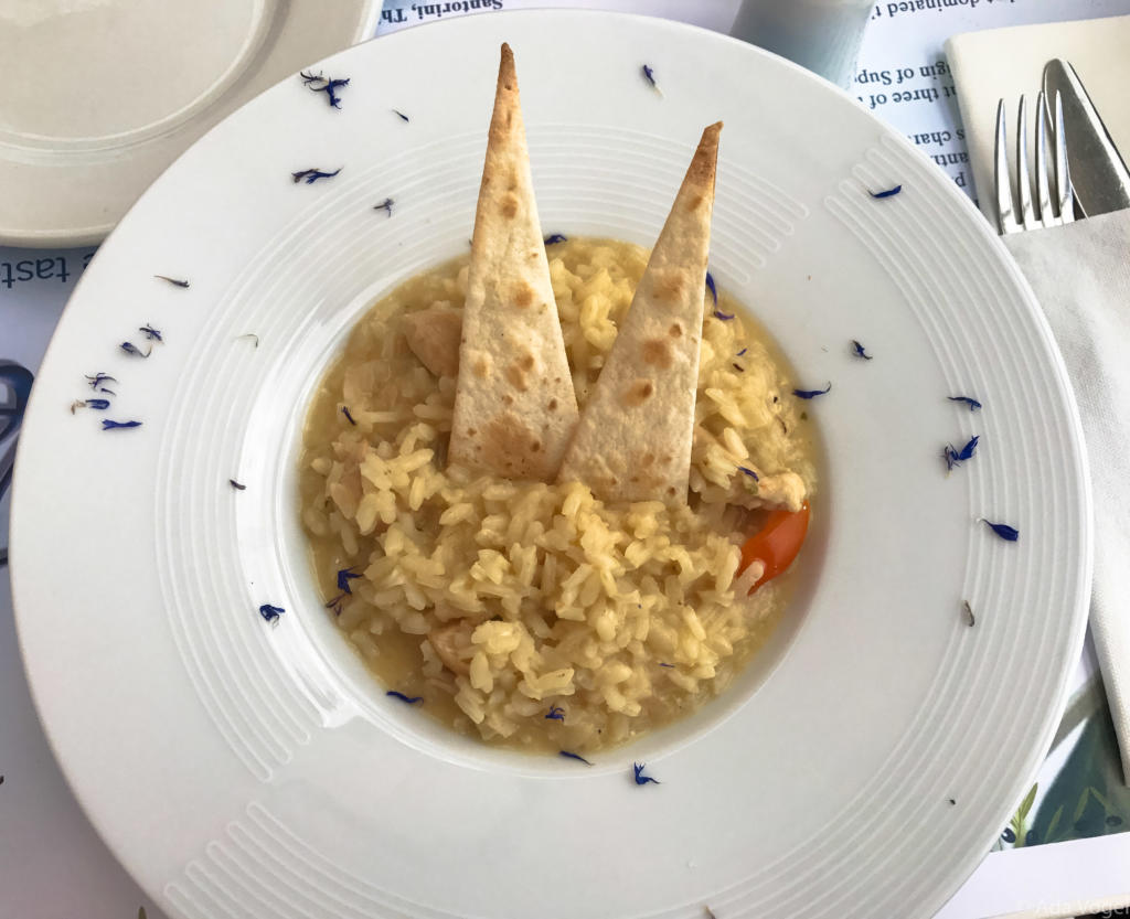 Chicken risotto served with pitta bread